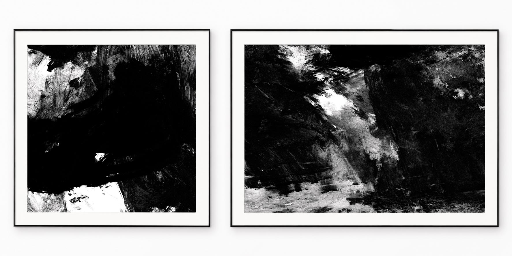 Two square black and white abstract paintings with silver textures, in thin black frames